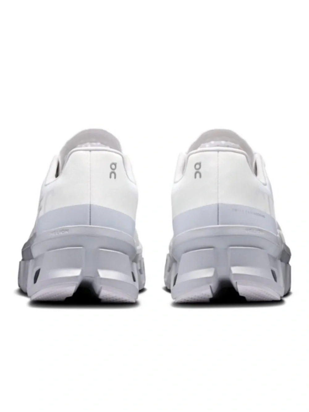On Running Women’s athletic shoes in White and Light Gray